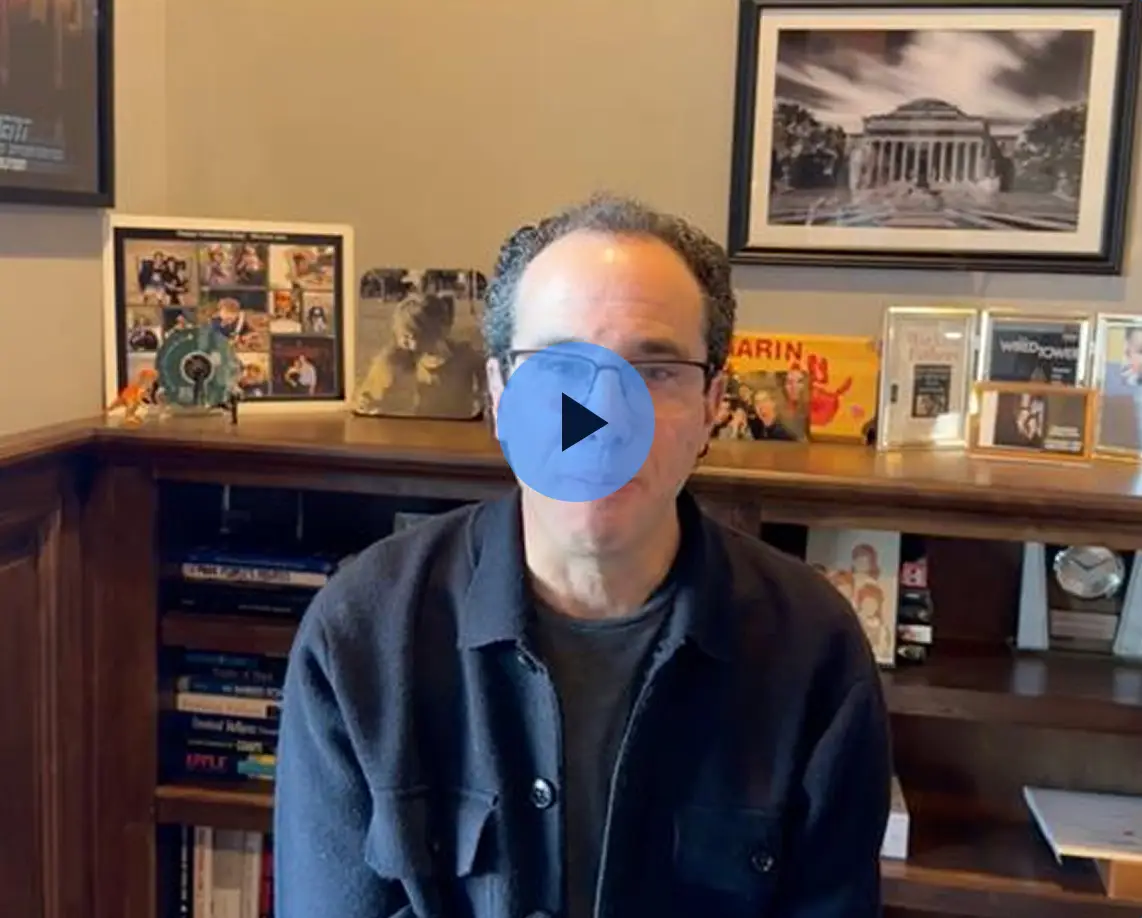 Headshot of Matthew Pittinsky with a play button