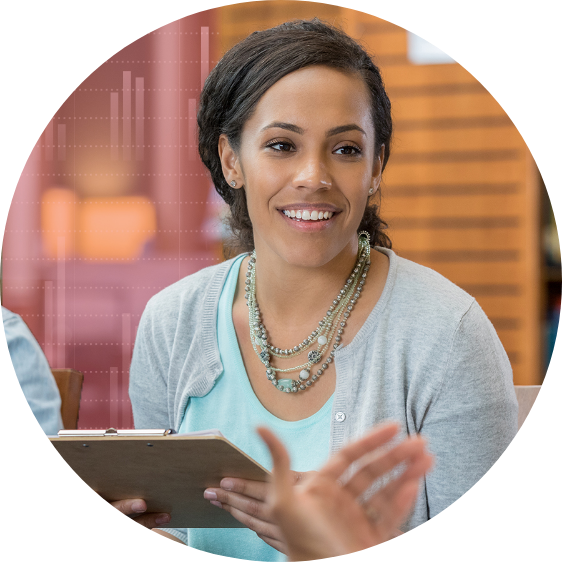 Photo of a woman presenting while holding a clipboard