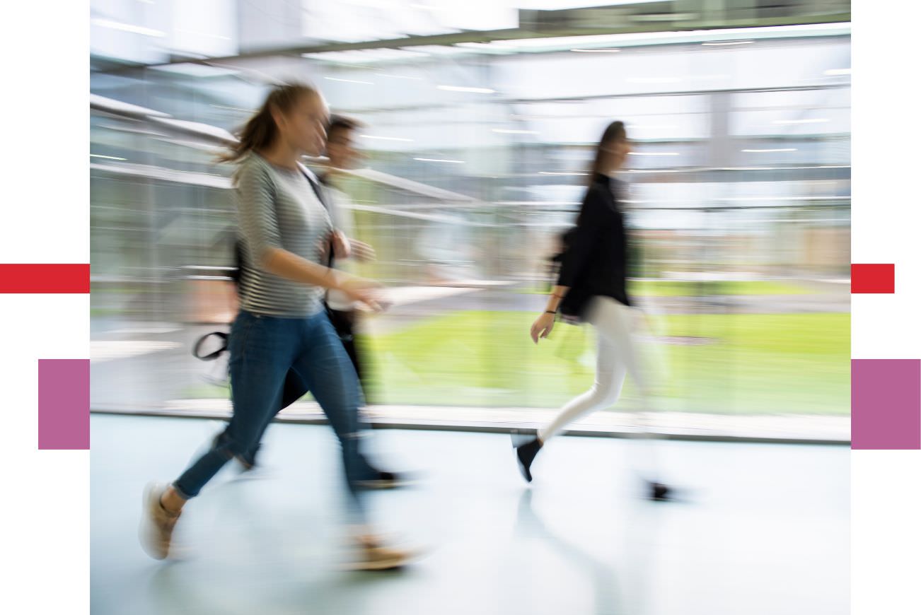 Motion blurred image of students walking