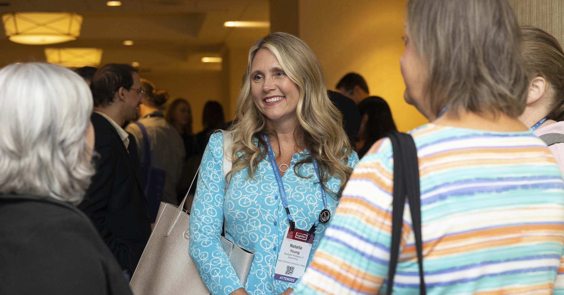 Attendees networking after a session