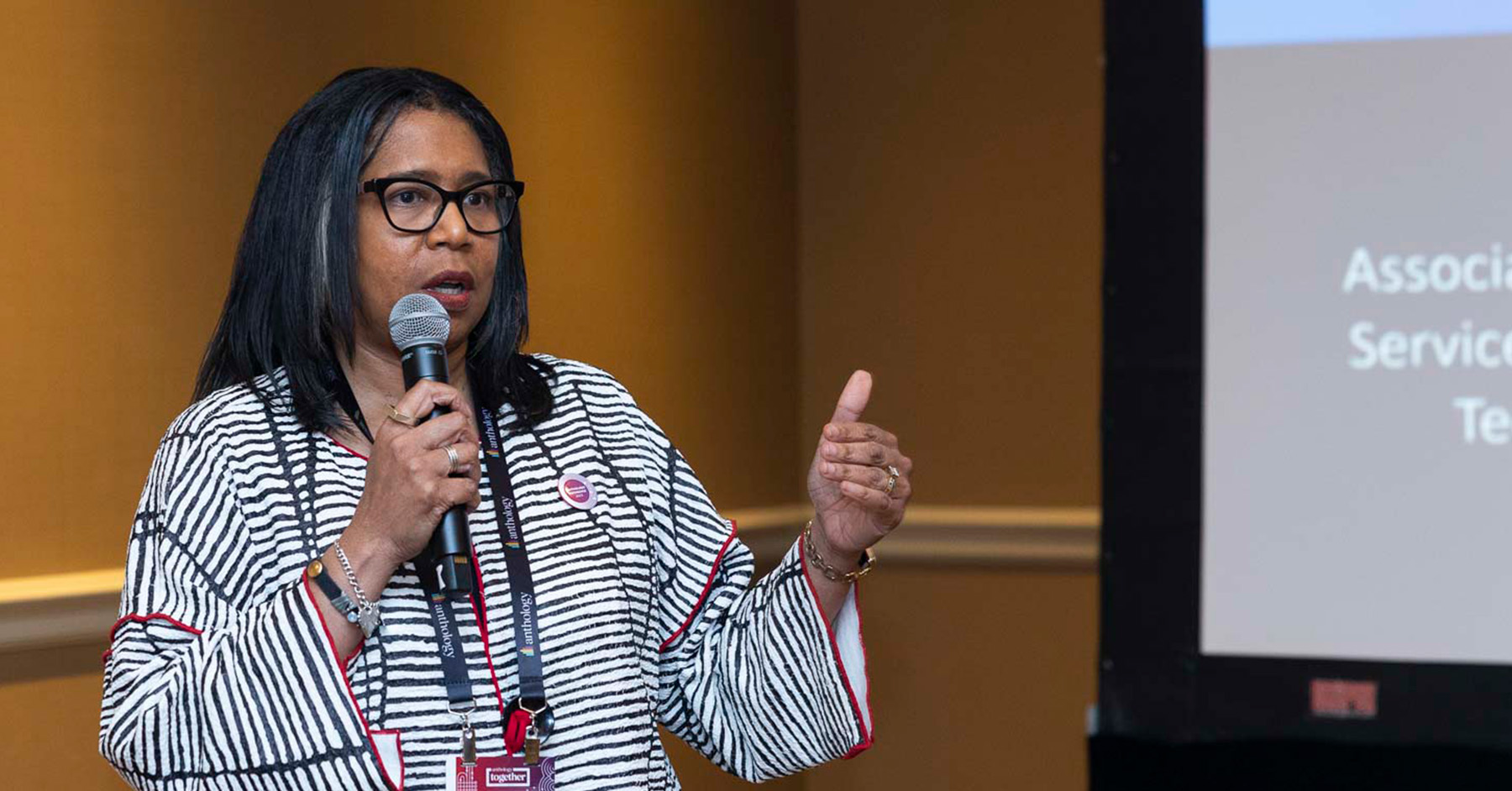 A woman giving a session presentation