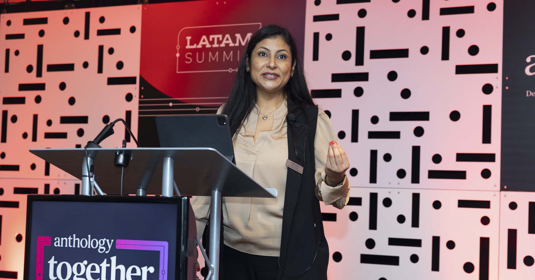 A woman giving a presetation at the LATAM Summit