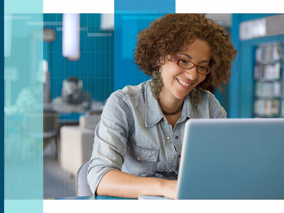 A woman working on a laptop