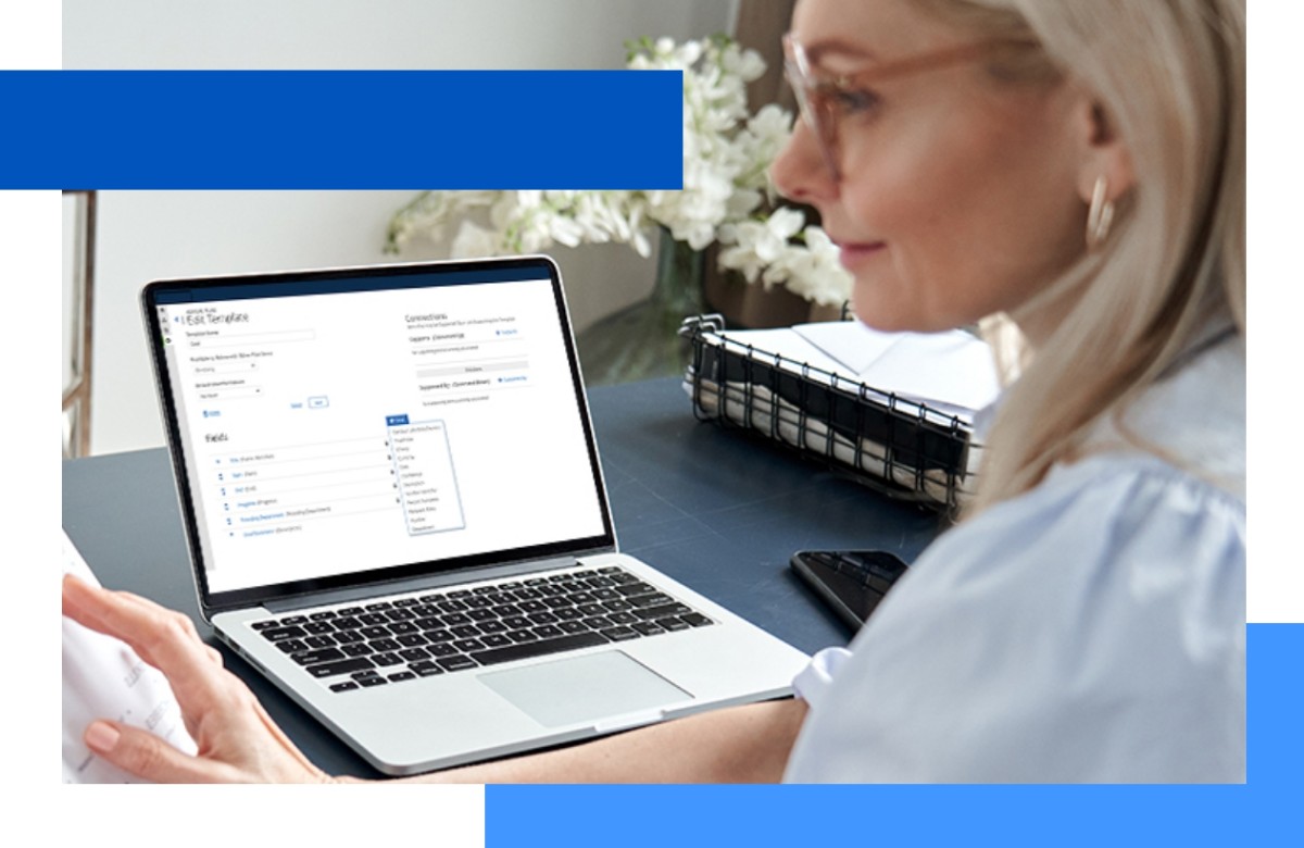 Photo of a woman working at a laptop