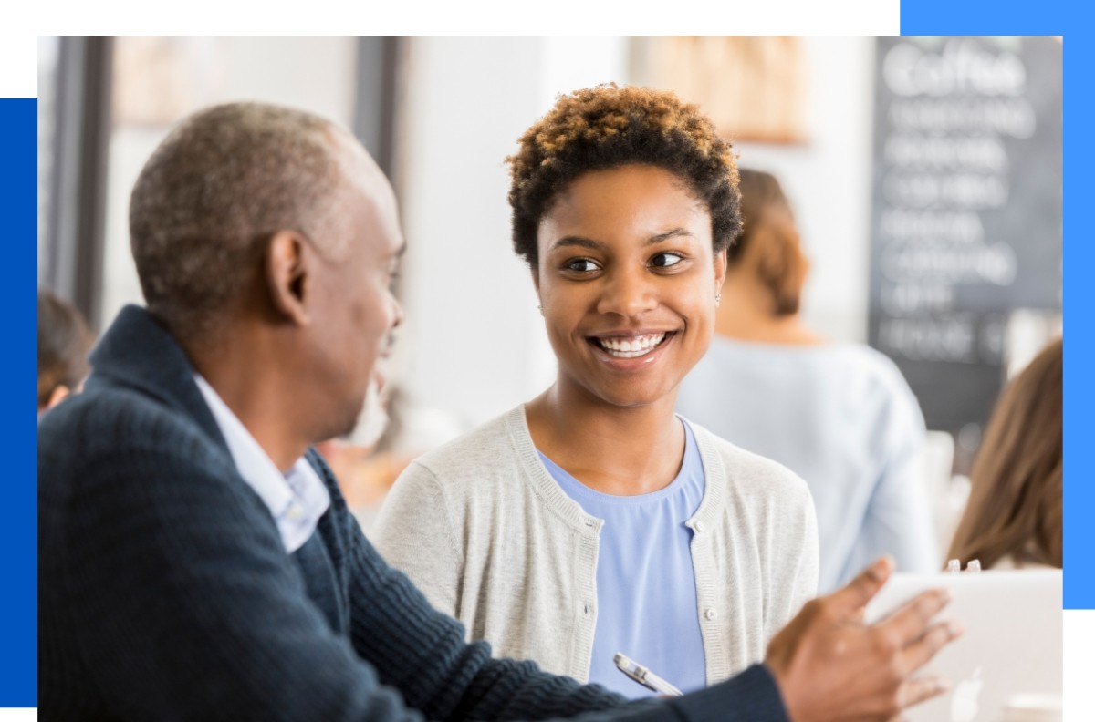 Photo of two people talking