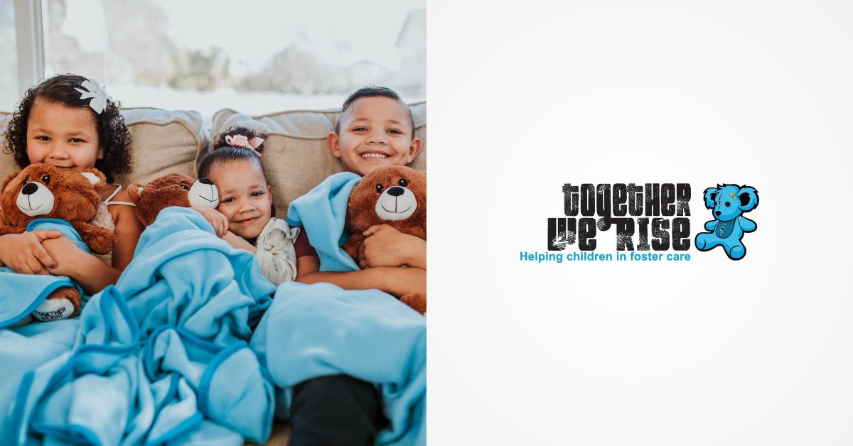 Photo of kids snuggled on the couch next to the Together We Rise logo