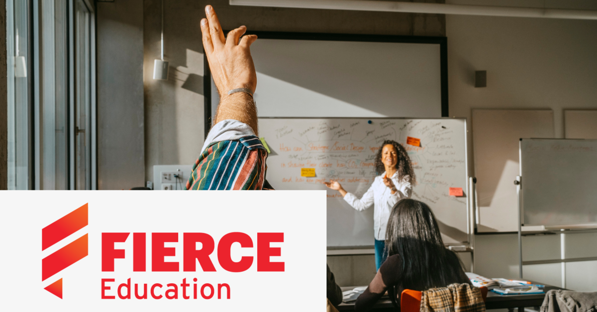 Image of a group of students with their teacher in a classroom. On the lower left side of the graphic is placed the Fierce Education logo. 