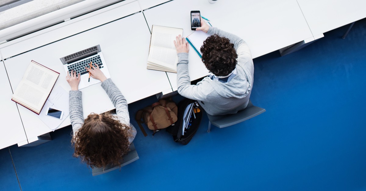 Overhead photo of two students working at a table