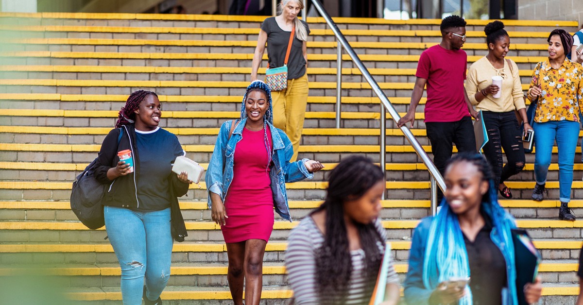 Photo of students walking down steps