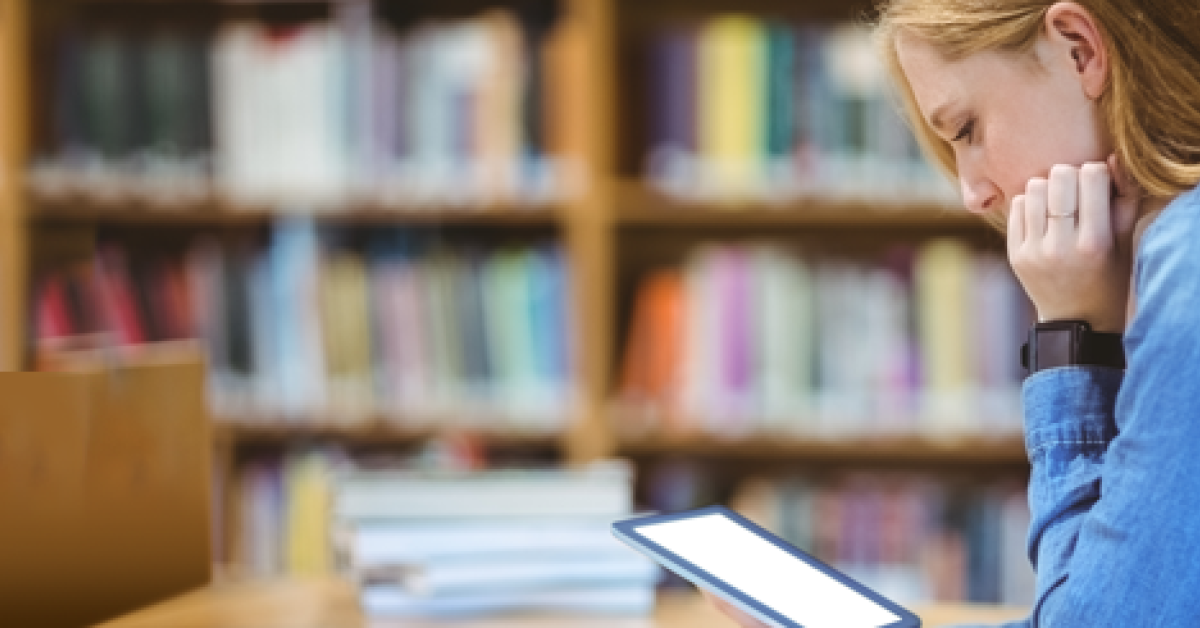 college student studying in library