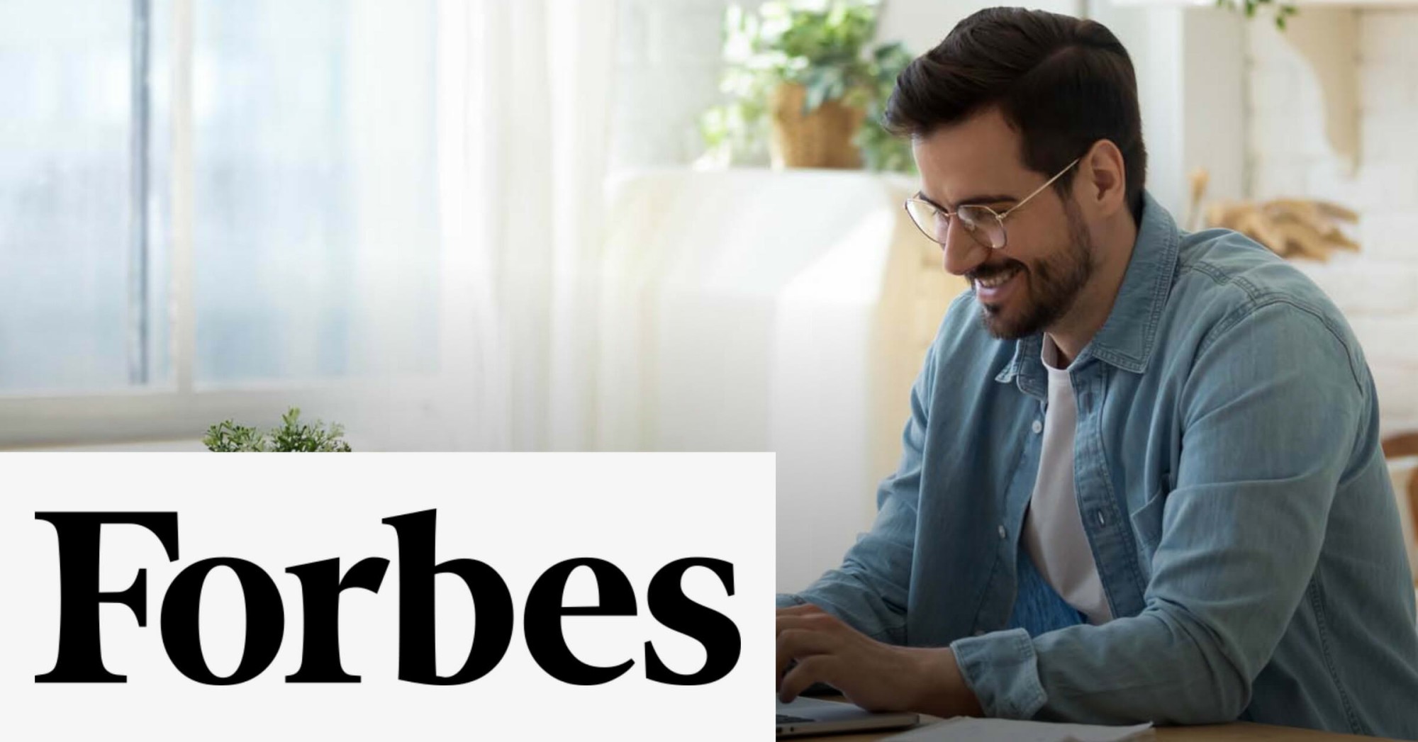 Photo of a man working at his laptop with the Forbes logo overlayed