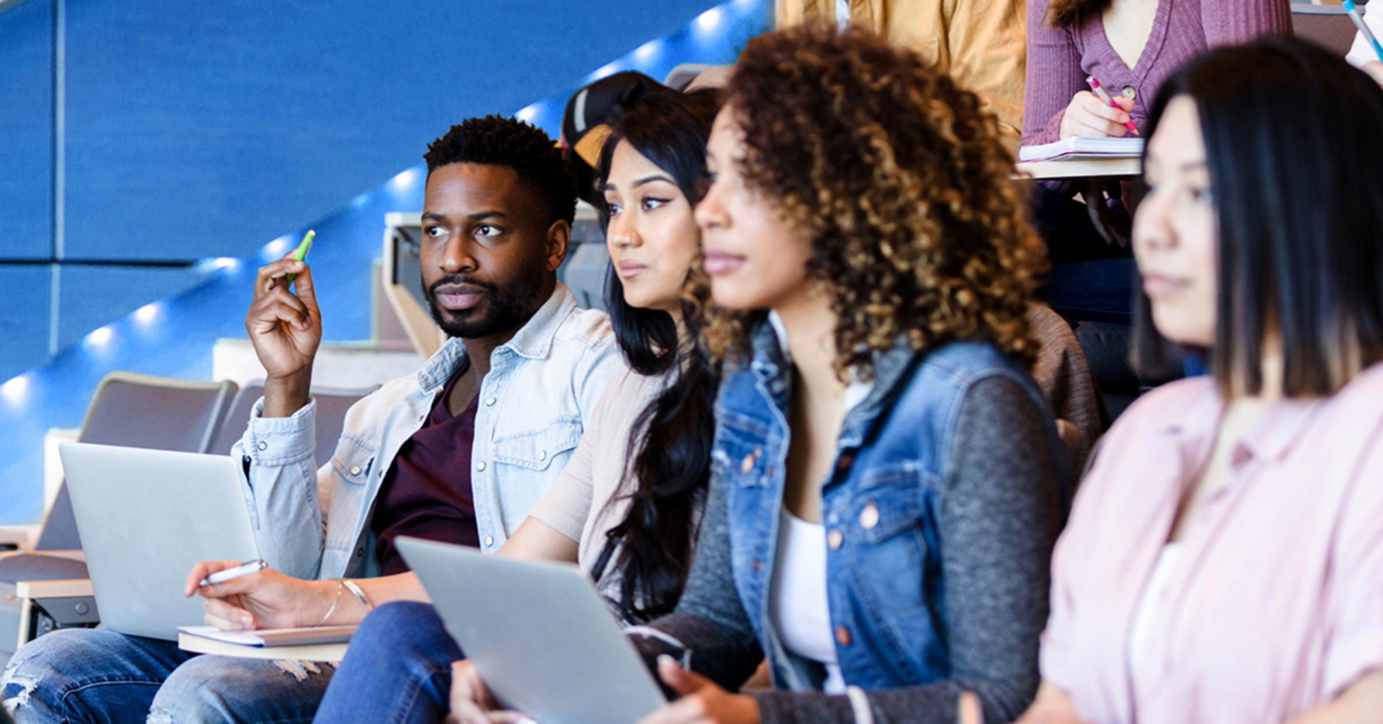 Photo of students attentively paying attention to a lecture