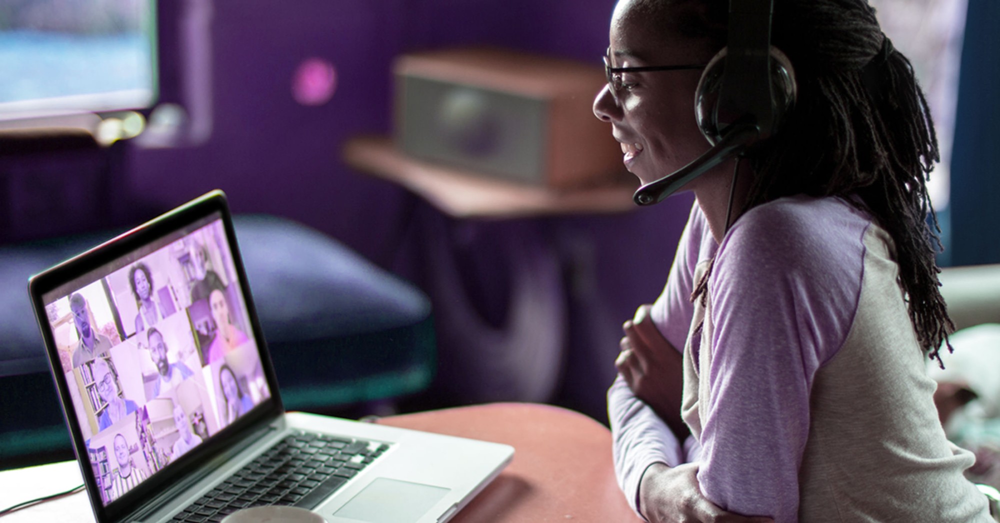 A woman on a video call with her team