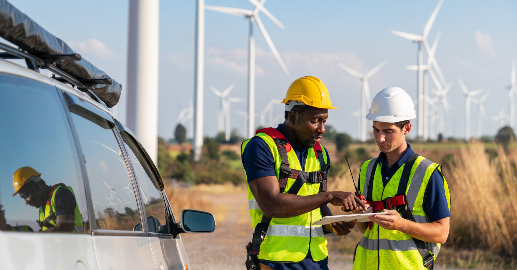 Two workers on a windfarm 