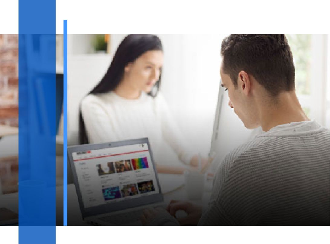 Photo of two people working opposite each other