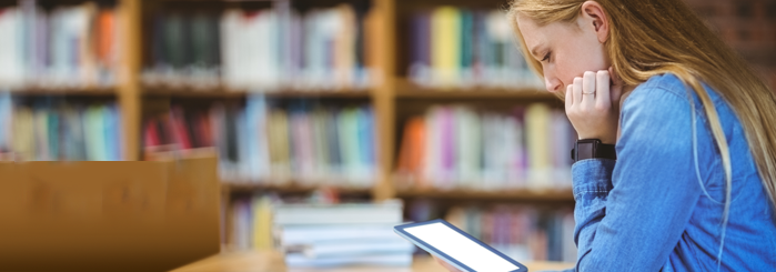 college student studying in library